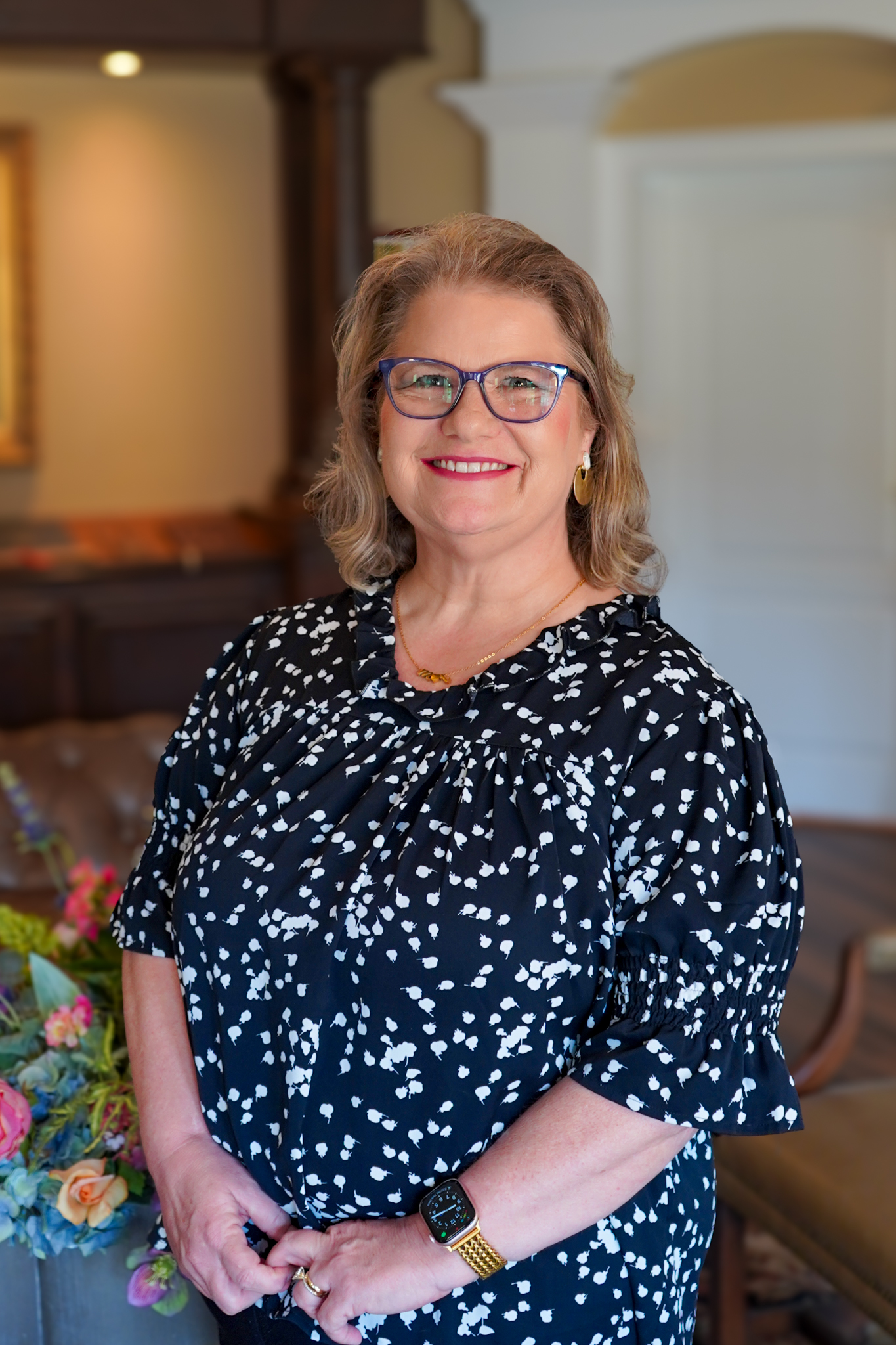 Huntsville personal injury law firm paralegal, Cathy Morgan poses for a professional photo