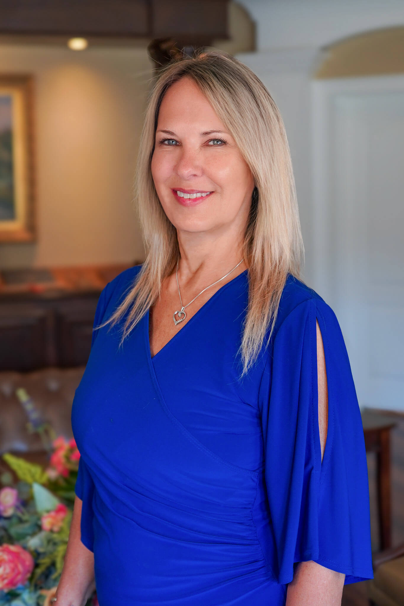 Huntsville personal injury law firm paralegal, Debbie Wright poses for a professional photo.