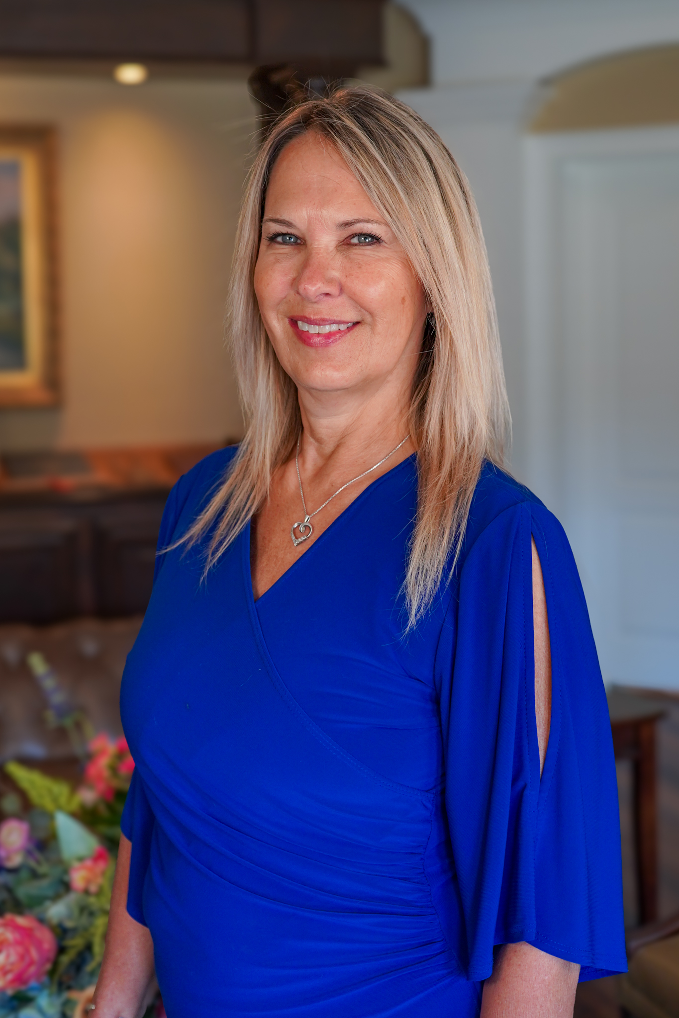 Huntsville personal injury law firm paralegal, Debbie Wright poses for a professional photo.