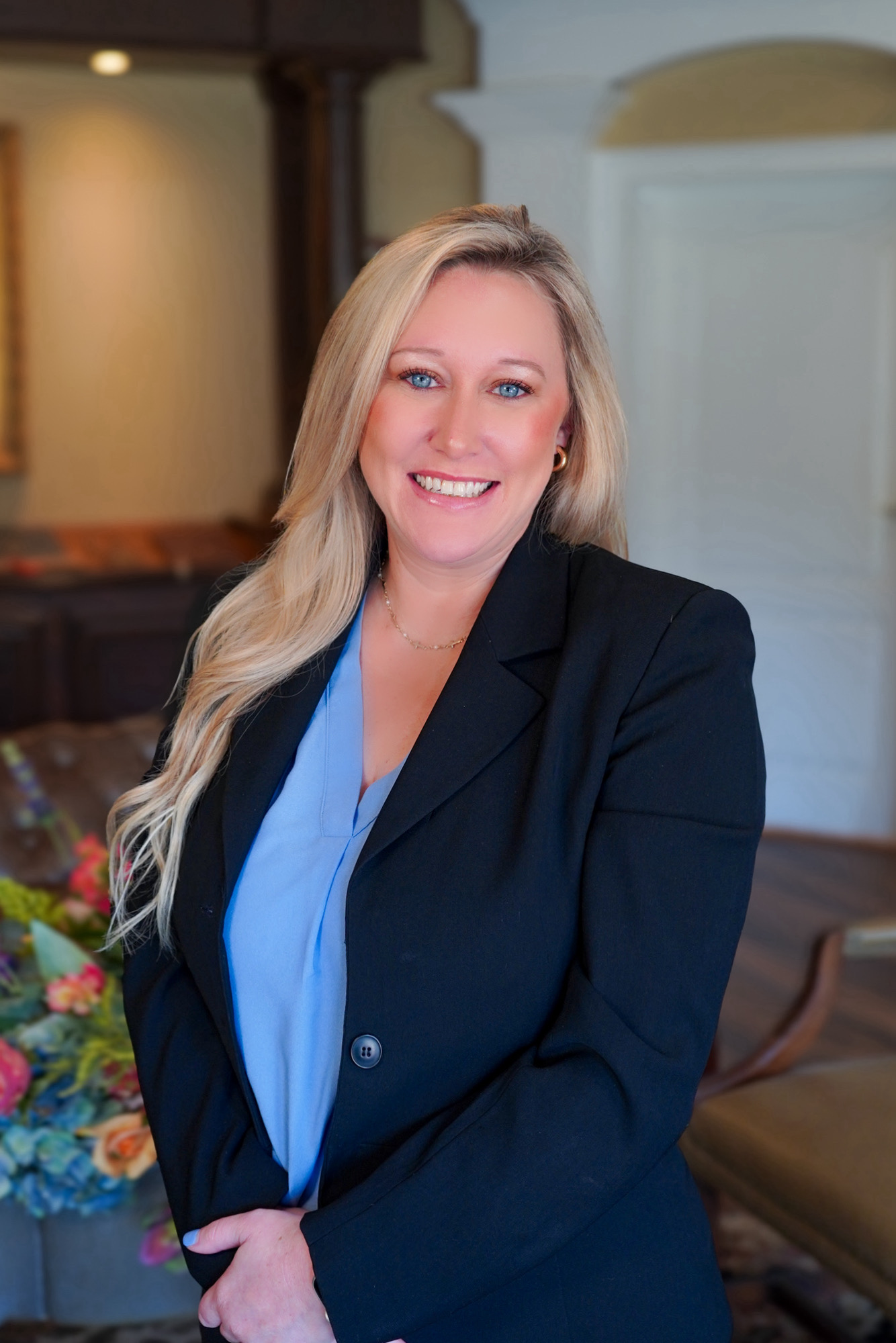 Huntsville personal injury law firm paralegal, Leslie Eldridge poses for a photo.