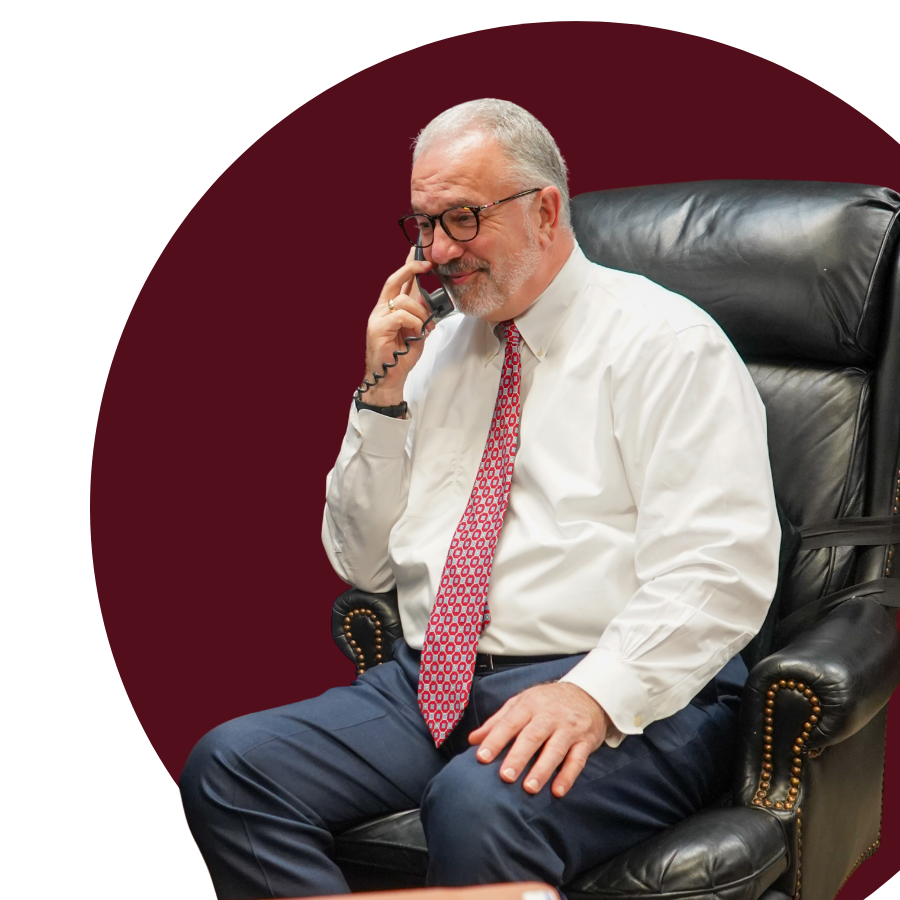 Property damage lawyer talking on the phone with a client